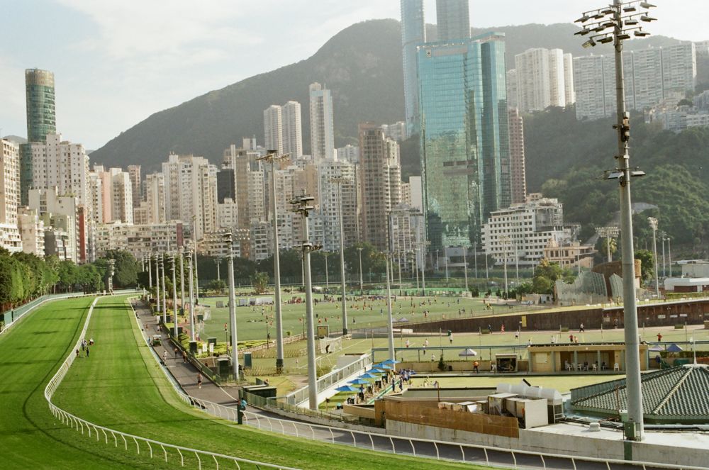 Happy Valley racecourse ringed by towers